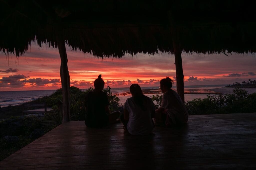 Guests watching the sunset at Boa Vida Rote